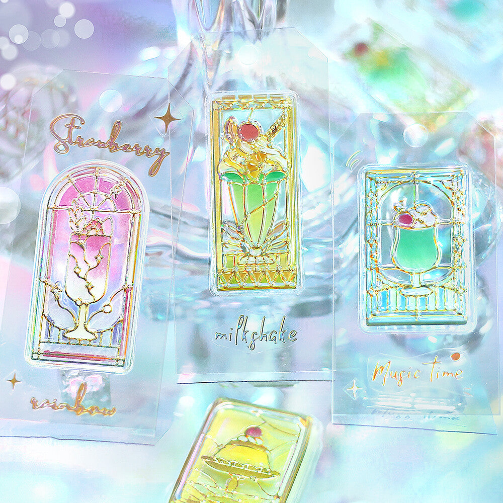 Set of colorful, decorative cards with gold accents on a sparkling background.