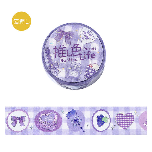 Purple washi tape with decorative designs and text on a white background