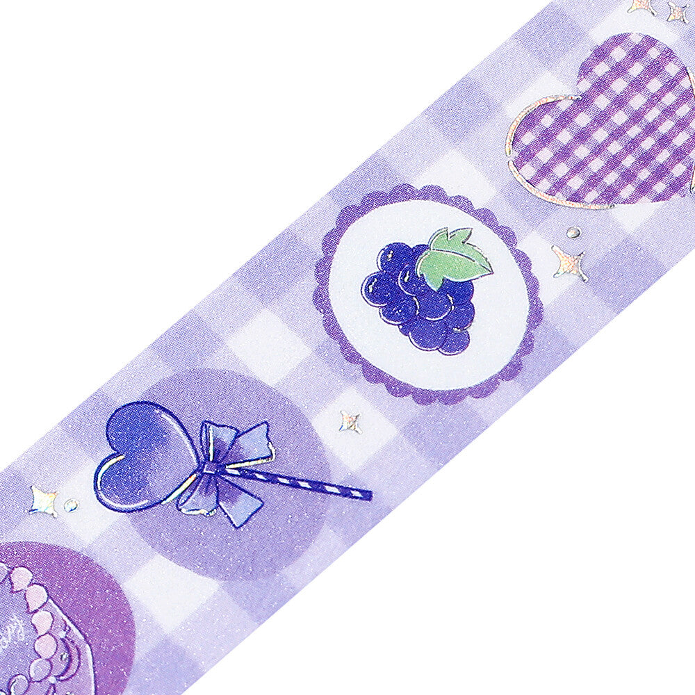 Decorative paper strip with purple and white patterns on a white background