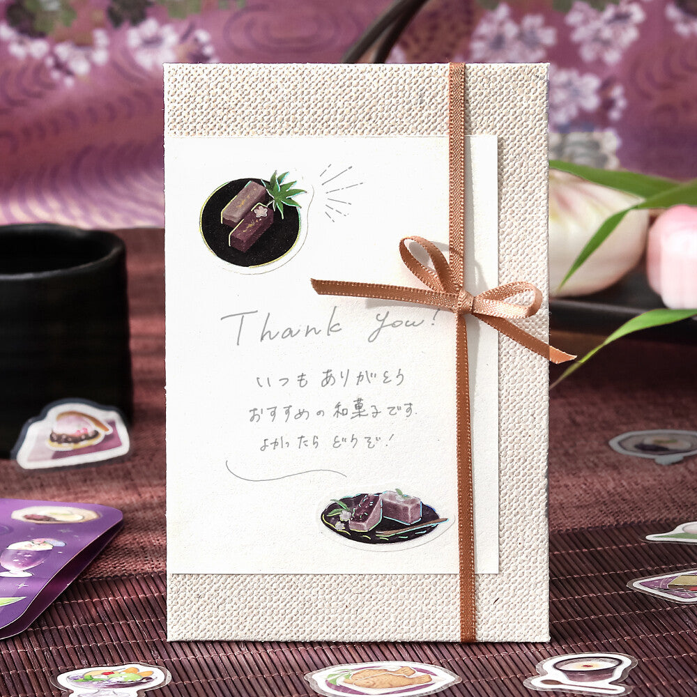 Purple stickers on thank you card