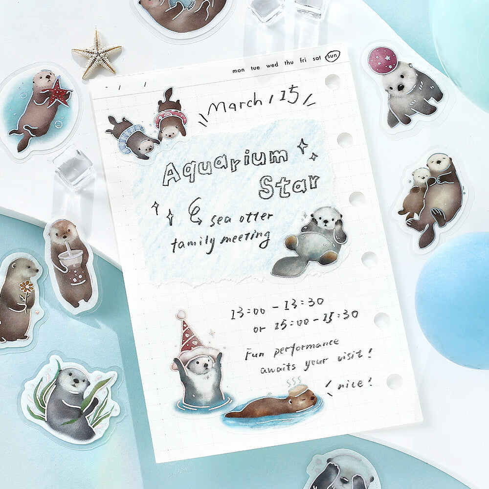 Stickers of Sea Otters used to decorate a card
