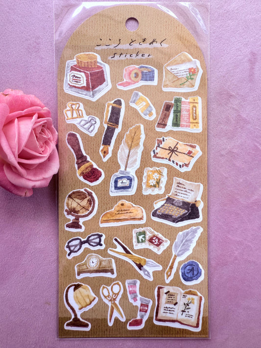 Pack of decorative stickers with vintage-themed designs on a pink background