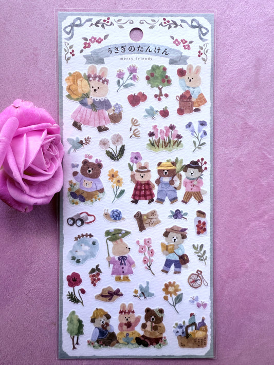 Sheet of decorative stickers with cartoon characters on a pink background