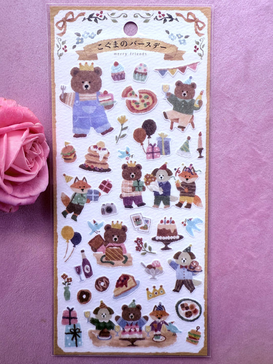 Sheet of decorative stickers featuring cartoon bears and related items on a pink background.