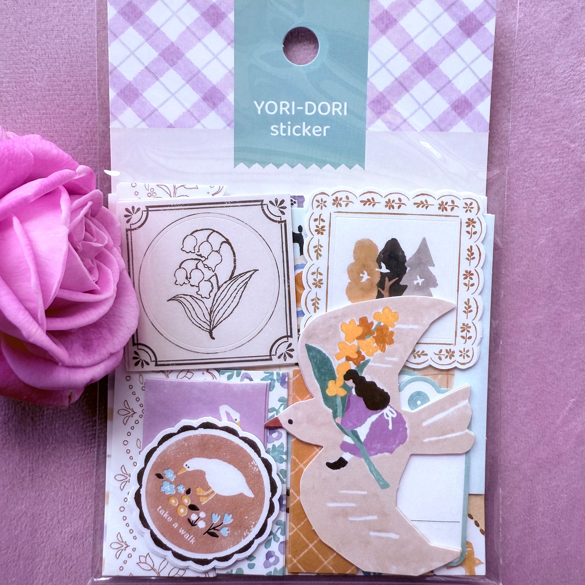 Pack of YORI-DORI stickers with a pink flower on a purple background