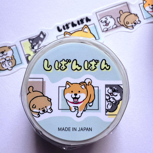 Round container with Shiba Inu illustrations and text on a light background