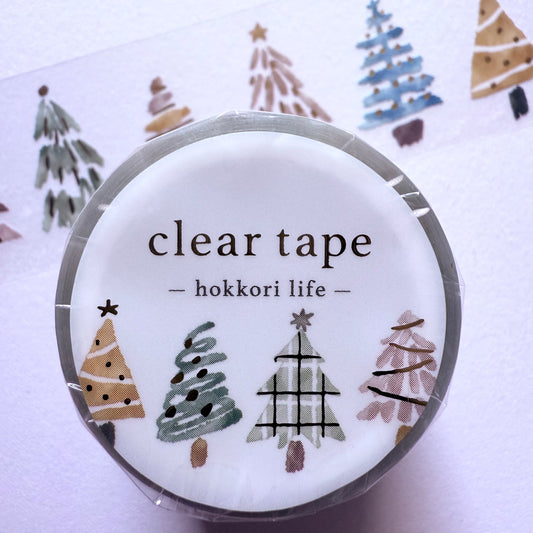 Clear tape with decorative labels on a white background