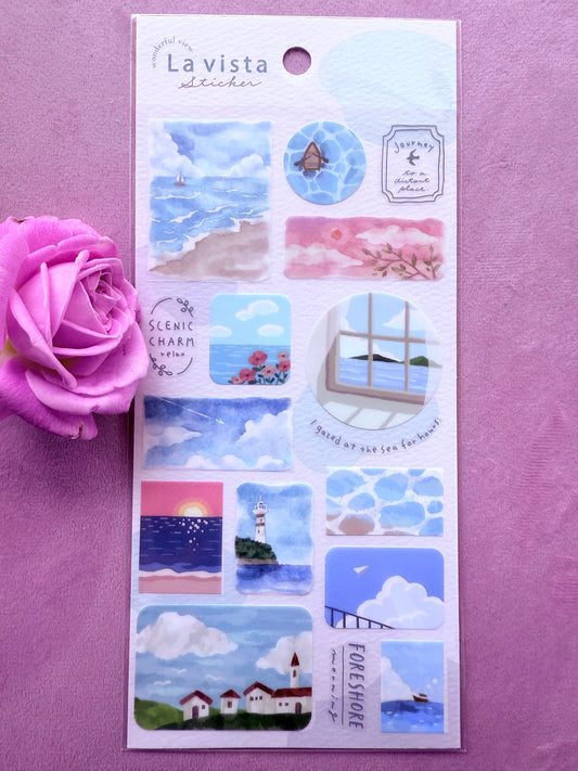 Sheet of La Vista stickers with scenic designs on a purple background with a pink rose.