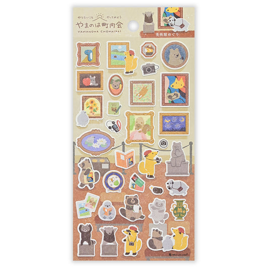 Sheet of decorative stickers with animal illustrations on a beige background