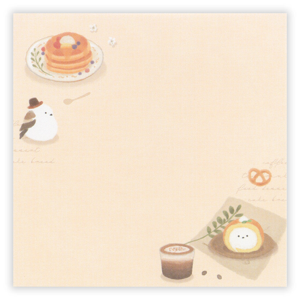 Illustrated notepad with cute food illustrations on a beige background