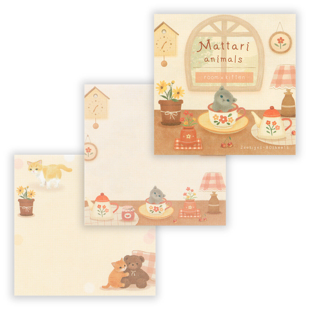 Three stationery pads with cute animal illustrations on a beige background