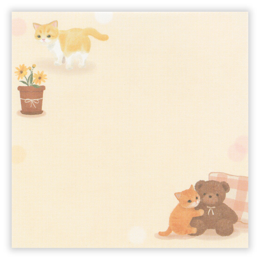 Notebook with cute illustrations of a cat, teddy bear, and potted plant on a light beige background.