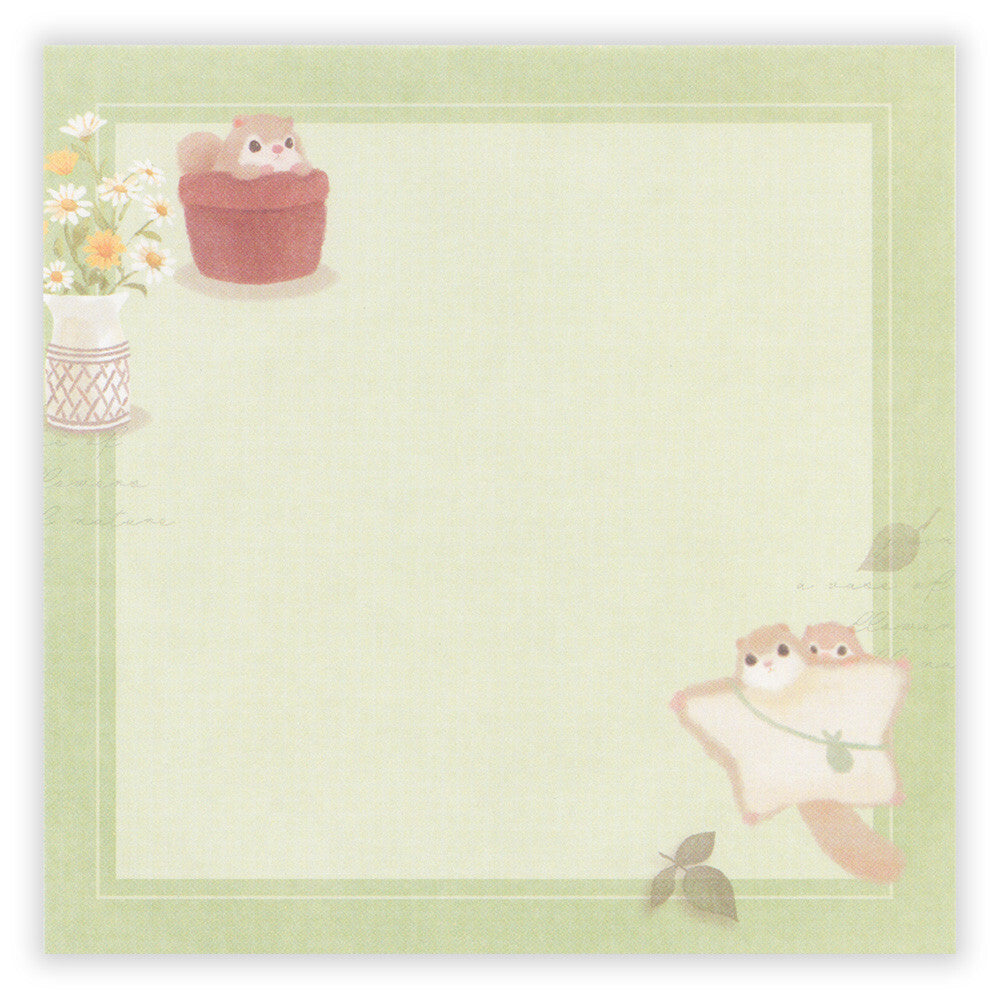 Stationery sheet with cute animal illustrations and a green border