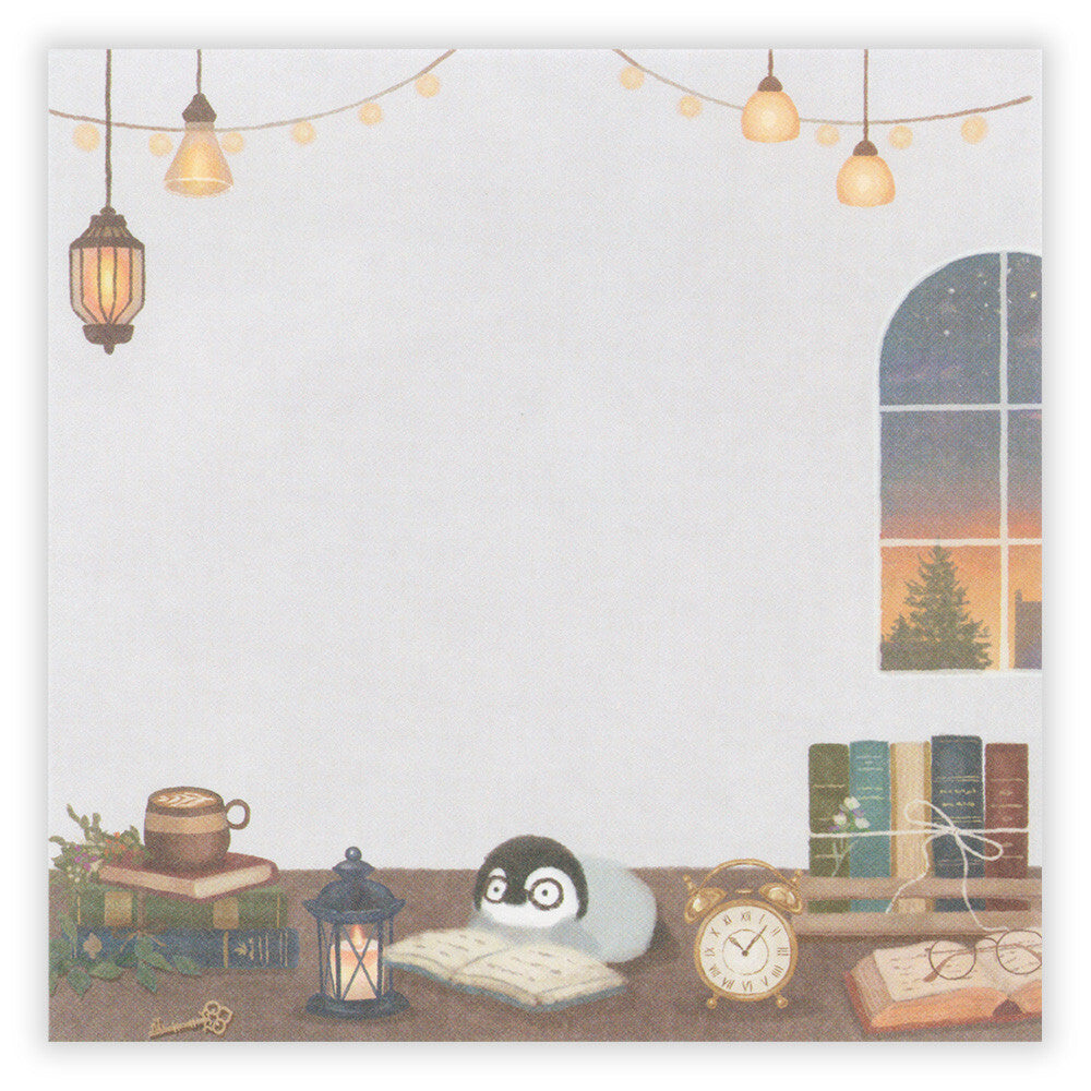 Illustration of a penguin reading a book on a desk with decorative items and a window view.