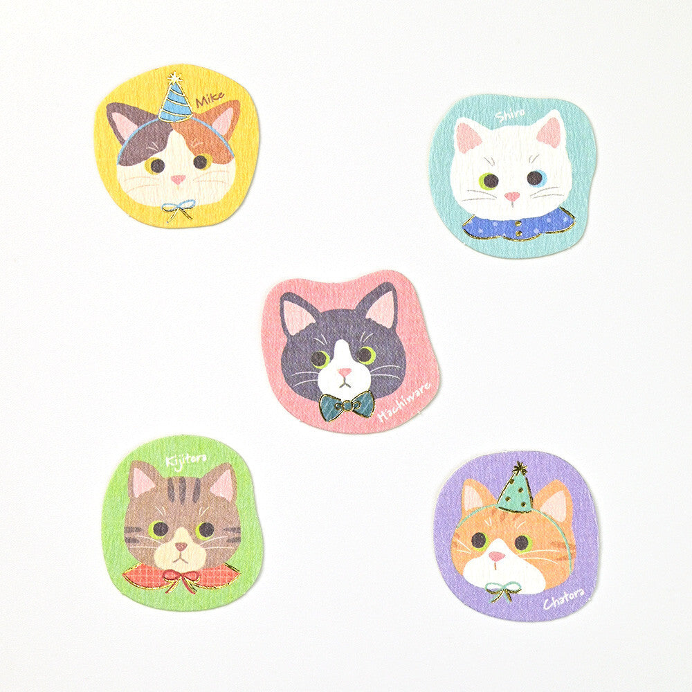 Five colorful stickers of cartoon cats on a white background