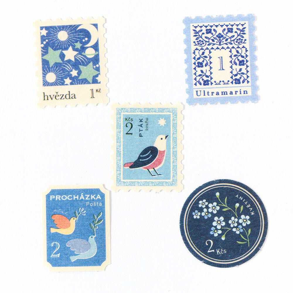 Collection of decorative postage stamps with blue and white designs on a white background