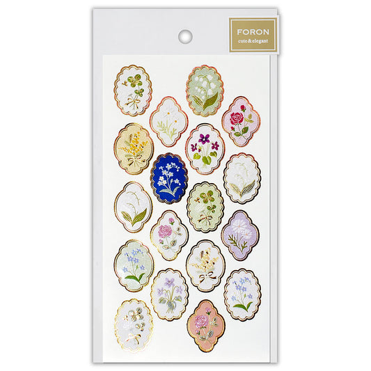 Packaged decorative stickers with floral designs on a white background
