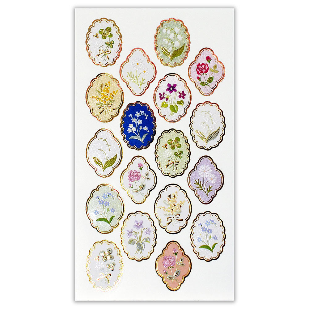 Decorative stickers with floral designs on a white background