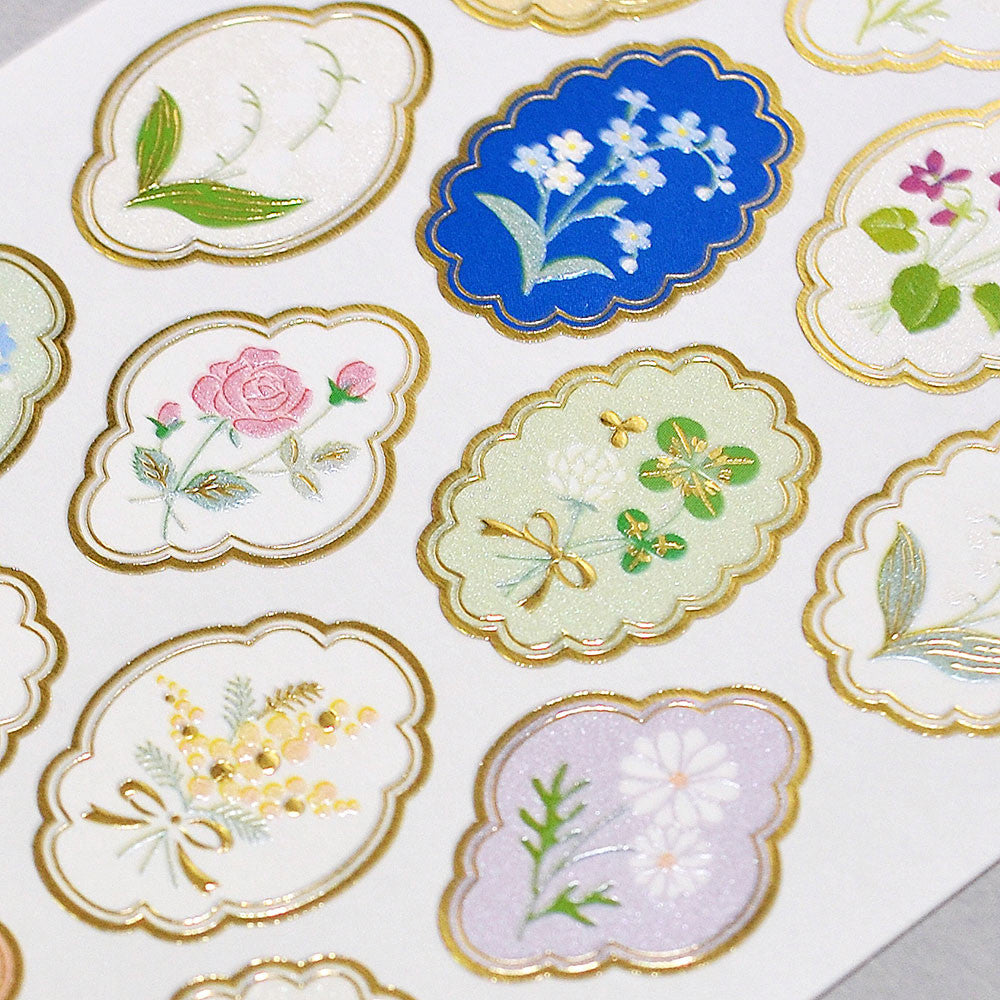 Decorative stickers with floral designs on a white background
