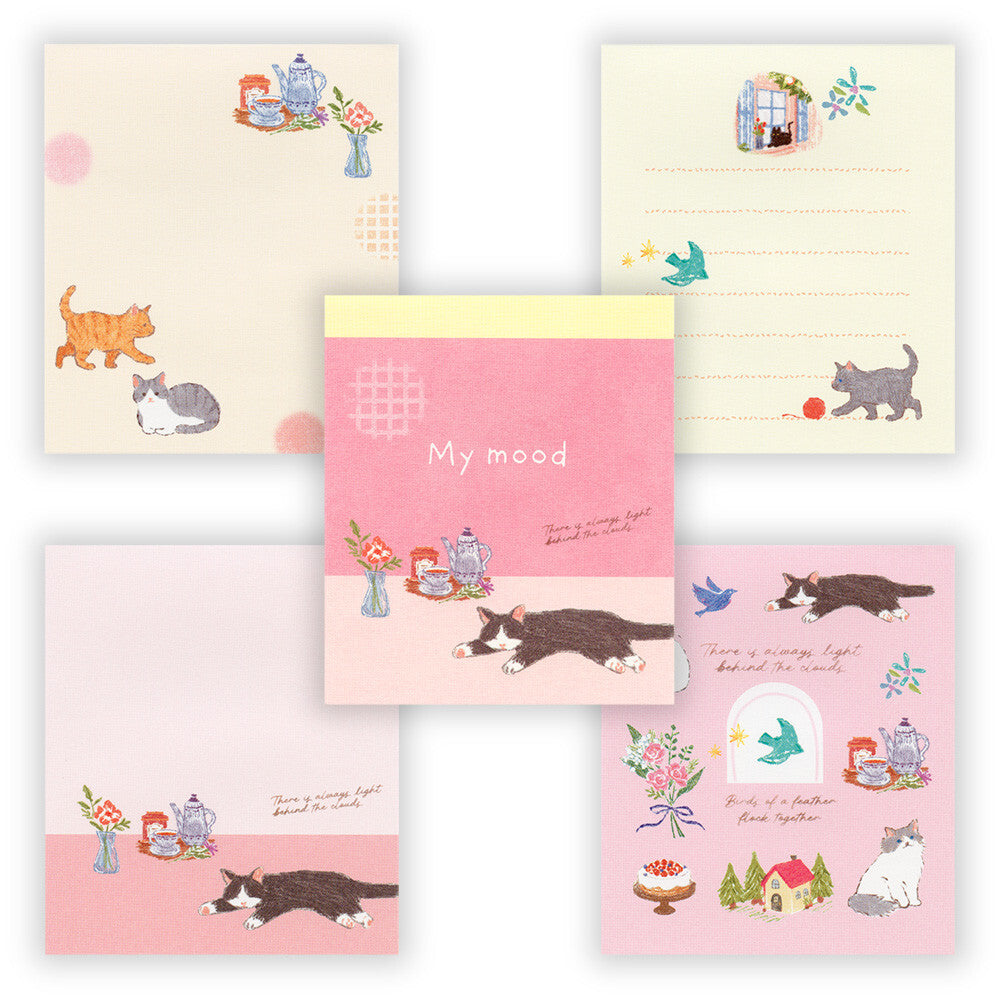 Set of stationery items with cute illustrations on a white background