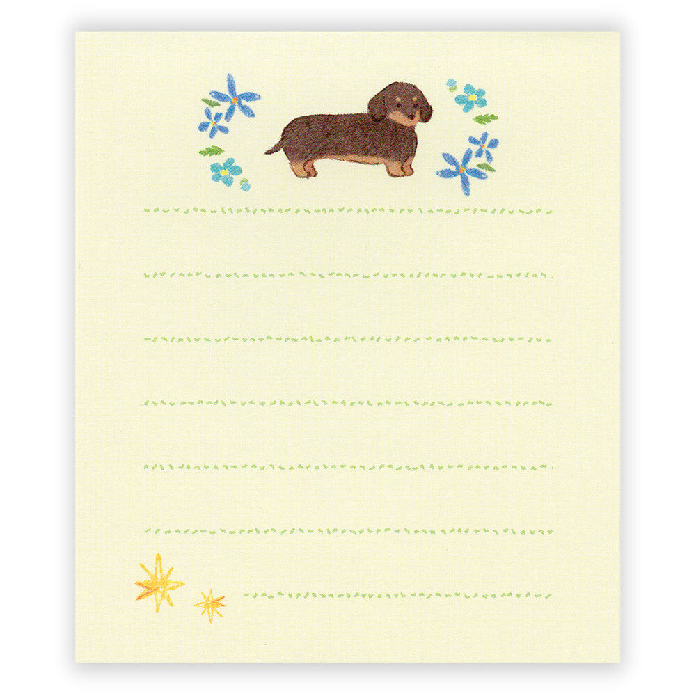 Notepad with a dachshund illustration on a yellow background
