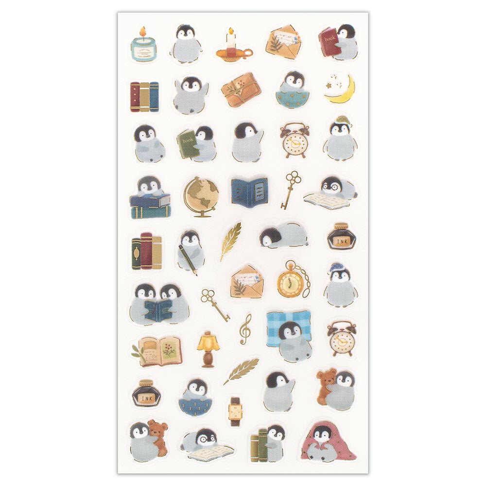 Sheet of decorative stickers with penguins, books, and other items on a white background