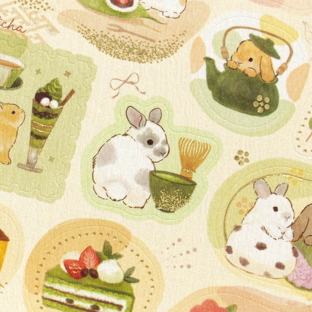 Pattern with rabbits, teapots, and desserts on a beige background