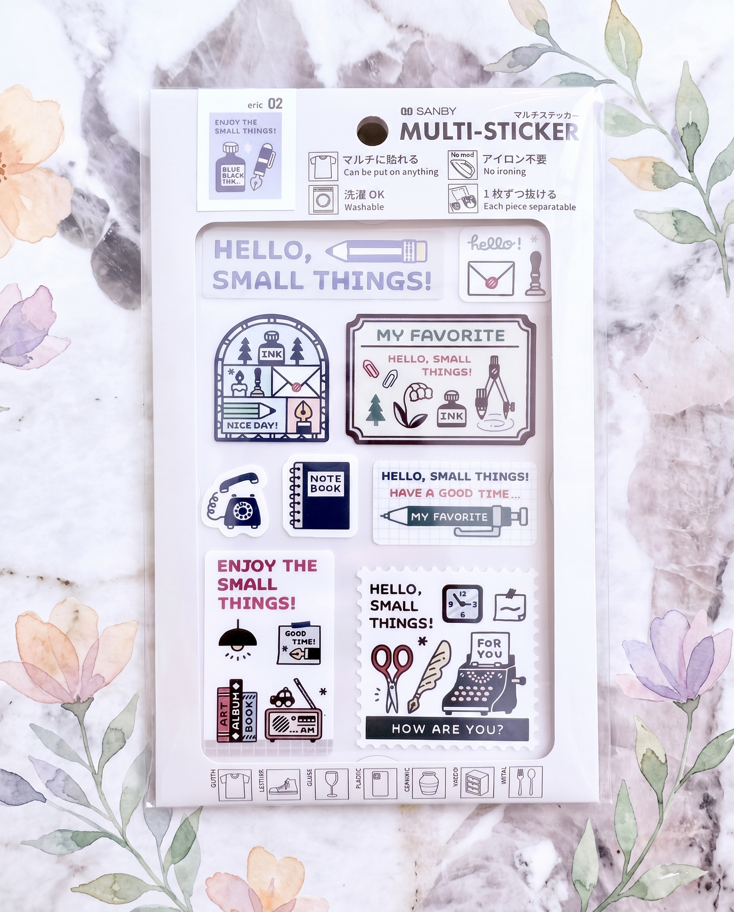 Pack of multi-sticker sheet with various designs on a floral and marble background