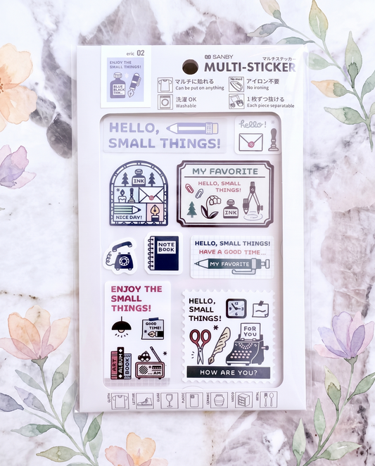 Pack of multi-sticker sheet with various designs on a floral and marble background