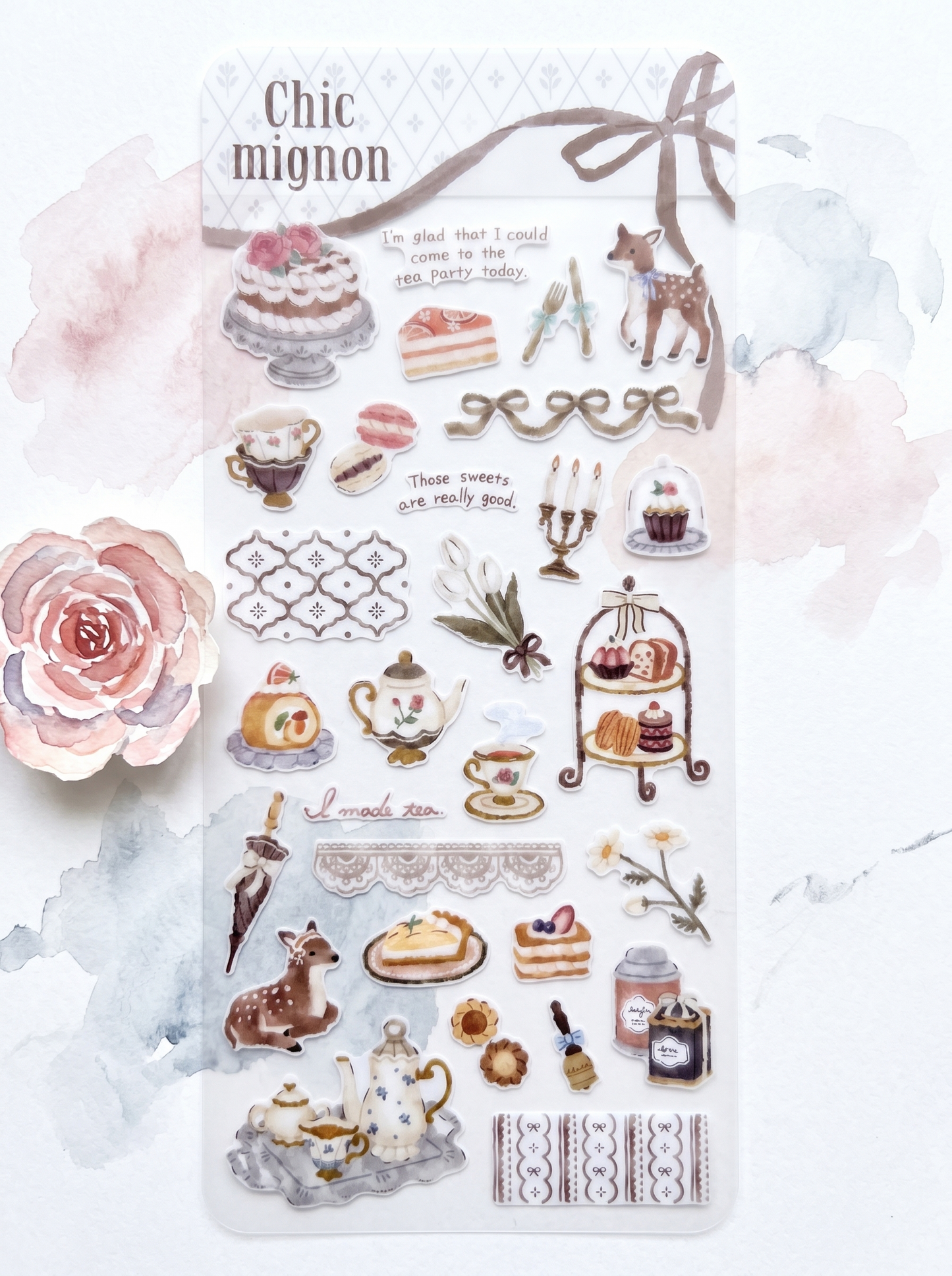 Sticker sheet with tea party-themed designs on a decorative card.