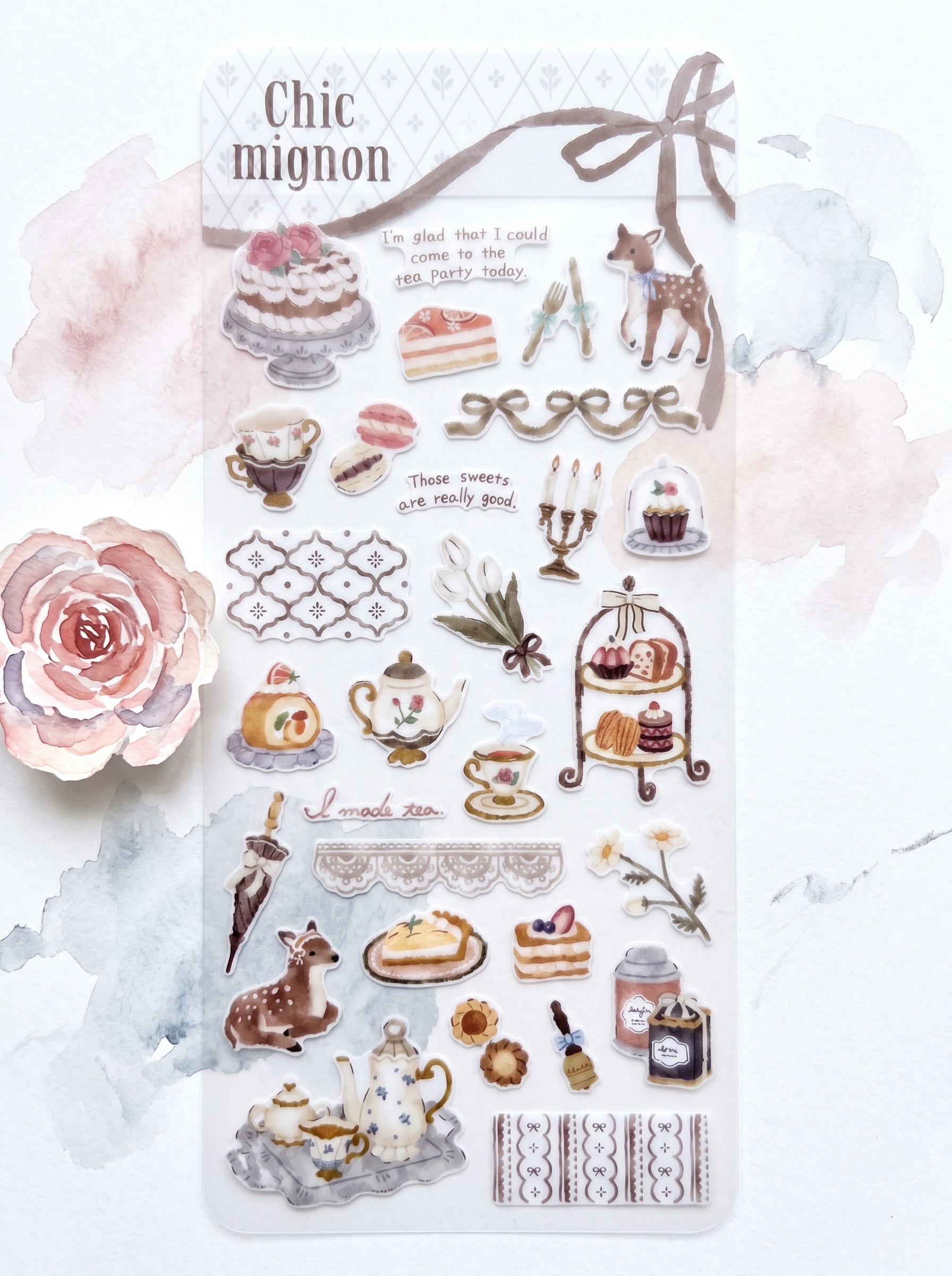 Sticker sheet with tea party-themed designs on a decorative card.