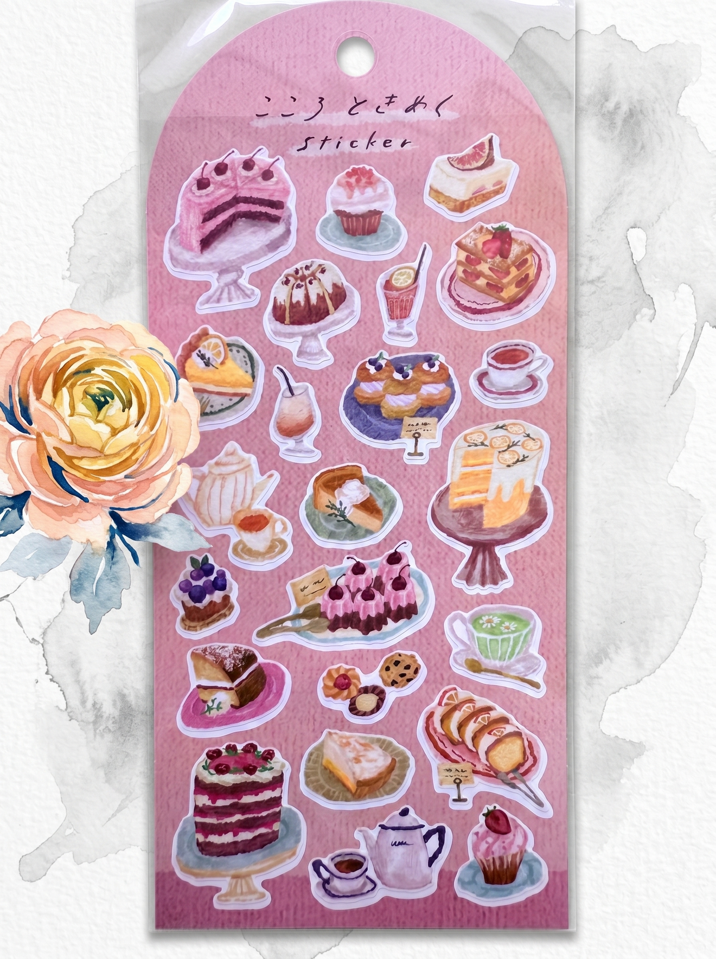 Sticker sheet with illustrations of desserts and tea sets on a pink background