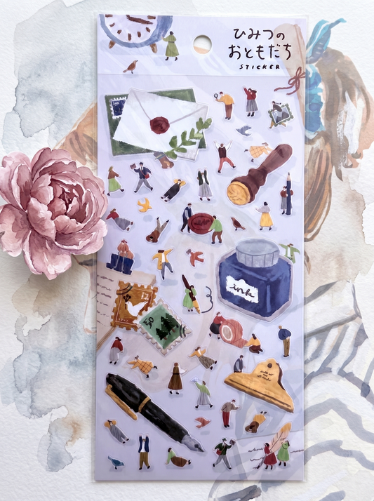 Sticker sheet with various illustrations on a textured surface with a pink flower.