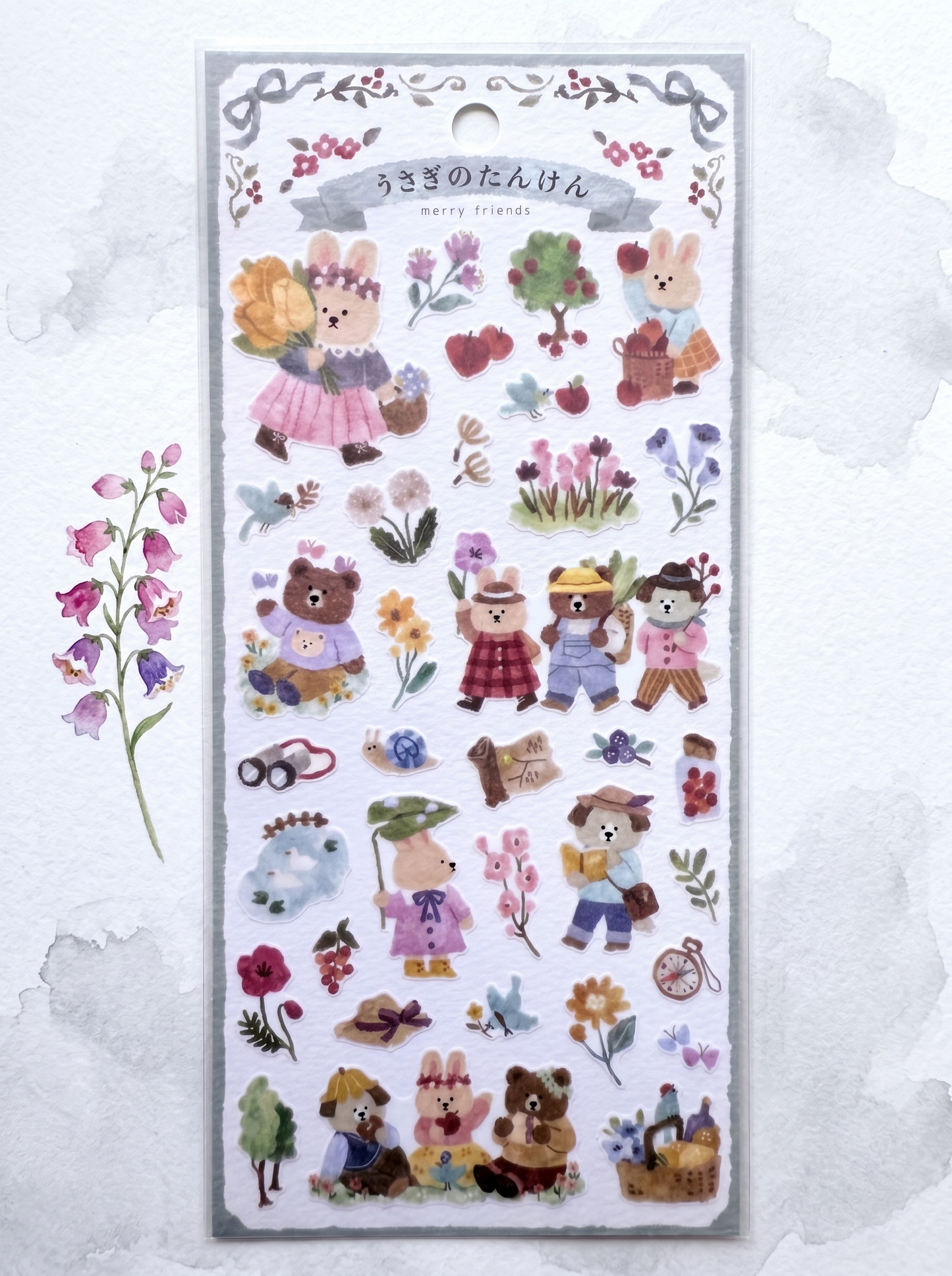 Sheet of decorative stickers with cartoon bears and flowers on a white background